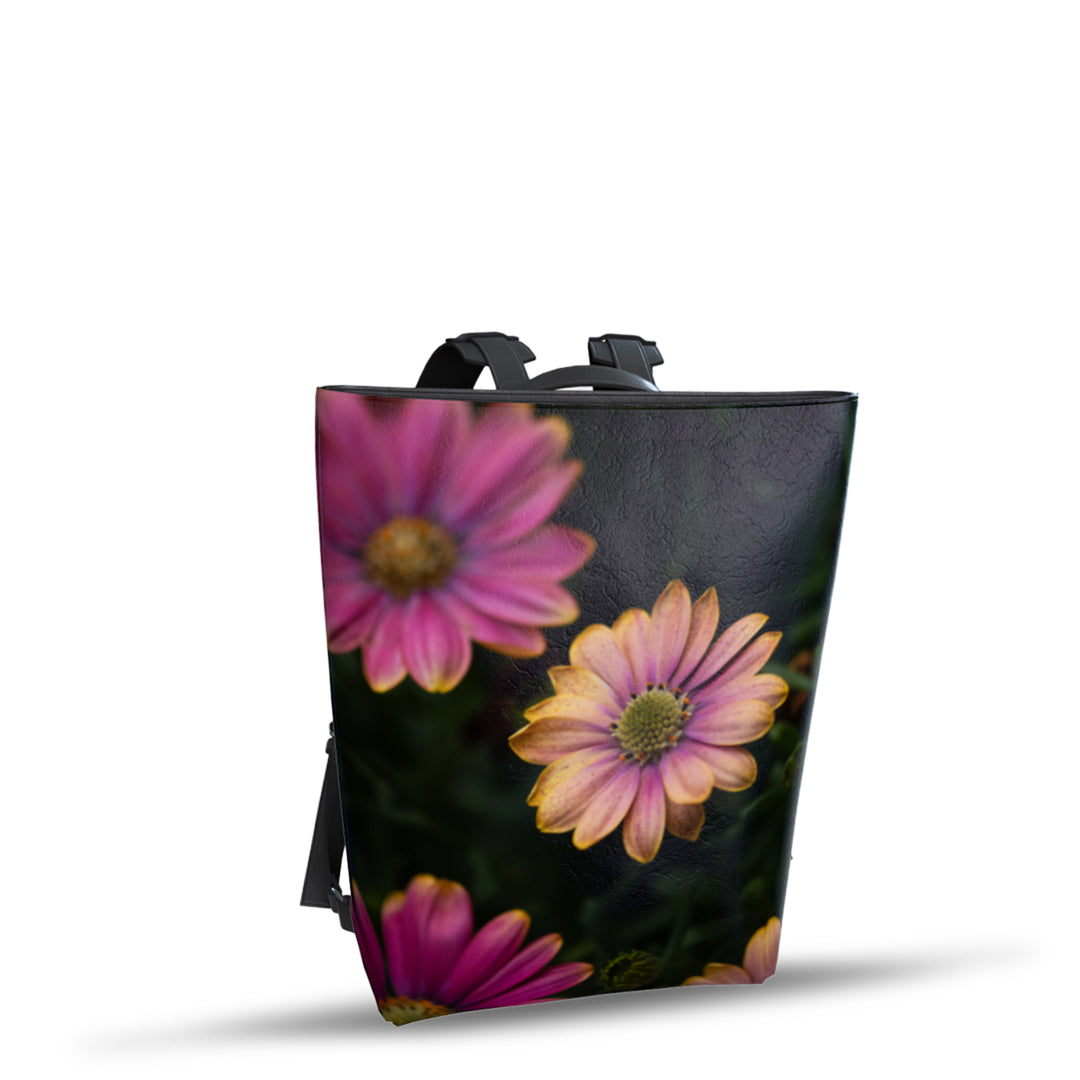 Stylish Windflower Vegan Leather Backpack featuring vibrant floral design, perfect for sustainable fashion lovers.