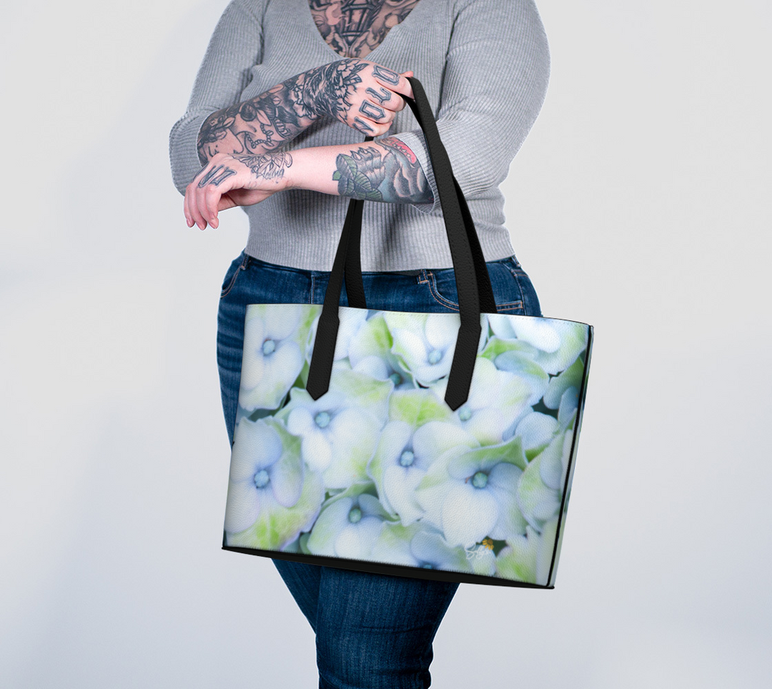 Stylish Hydrangea Faux Leather Handbag featuring floral design, perfect for eco-friendly fashion enthusiasts.
