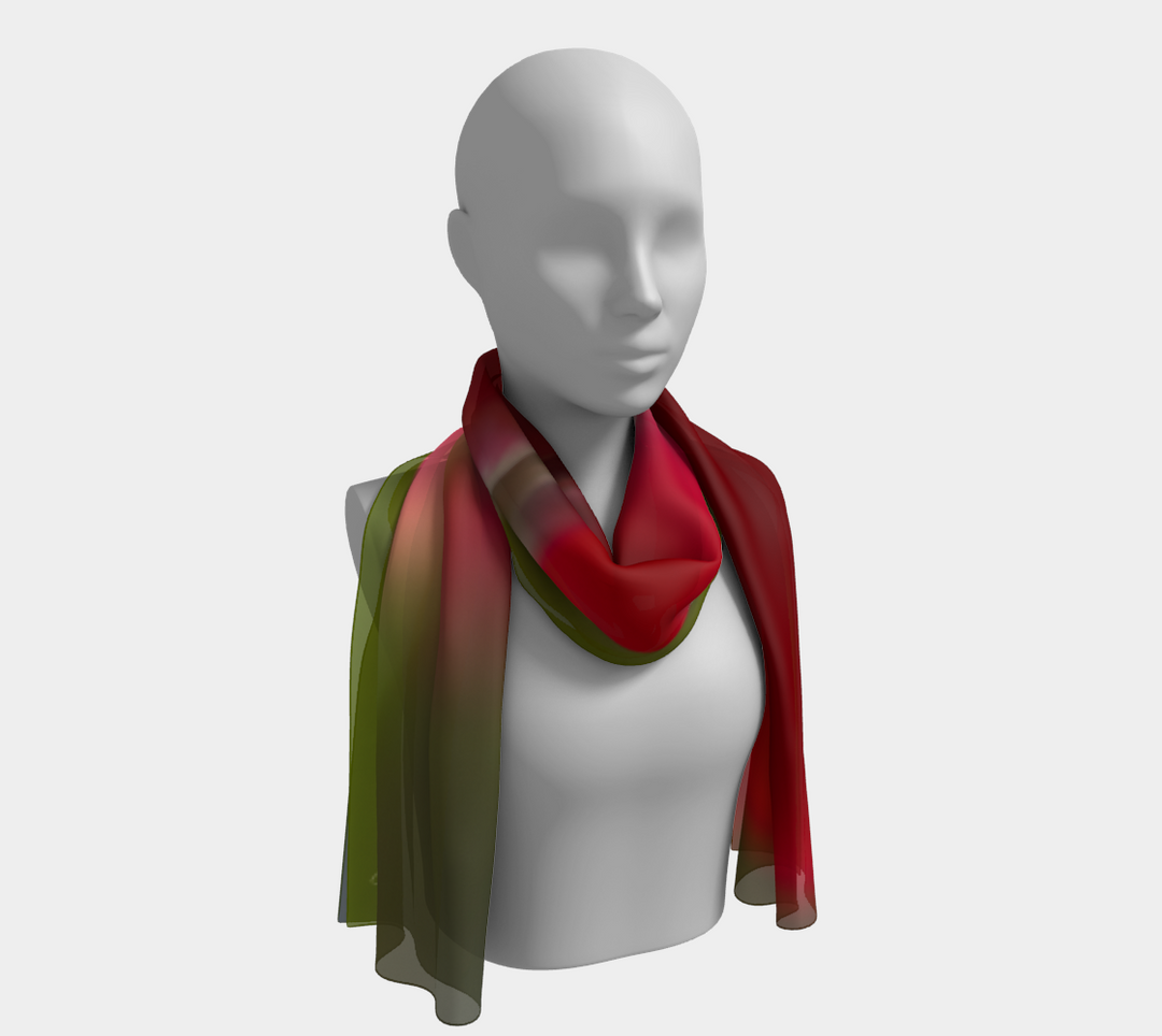 The red tulip surprise long scarf features a prominent red tulip on the upper portion of the scarf with another red tulip providing the gorgeous color in the background.  This scarf is gorgeous, the richness of the reds make it pop.  If you love red, and you love a pop of color you will absolutely love this scarf.  This scarf would be elegant no matter what you wear, white blouse or black dress or blazer a beautiful statement to wear for a casual evening or a night out.