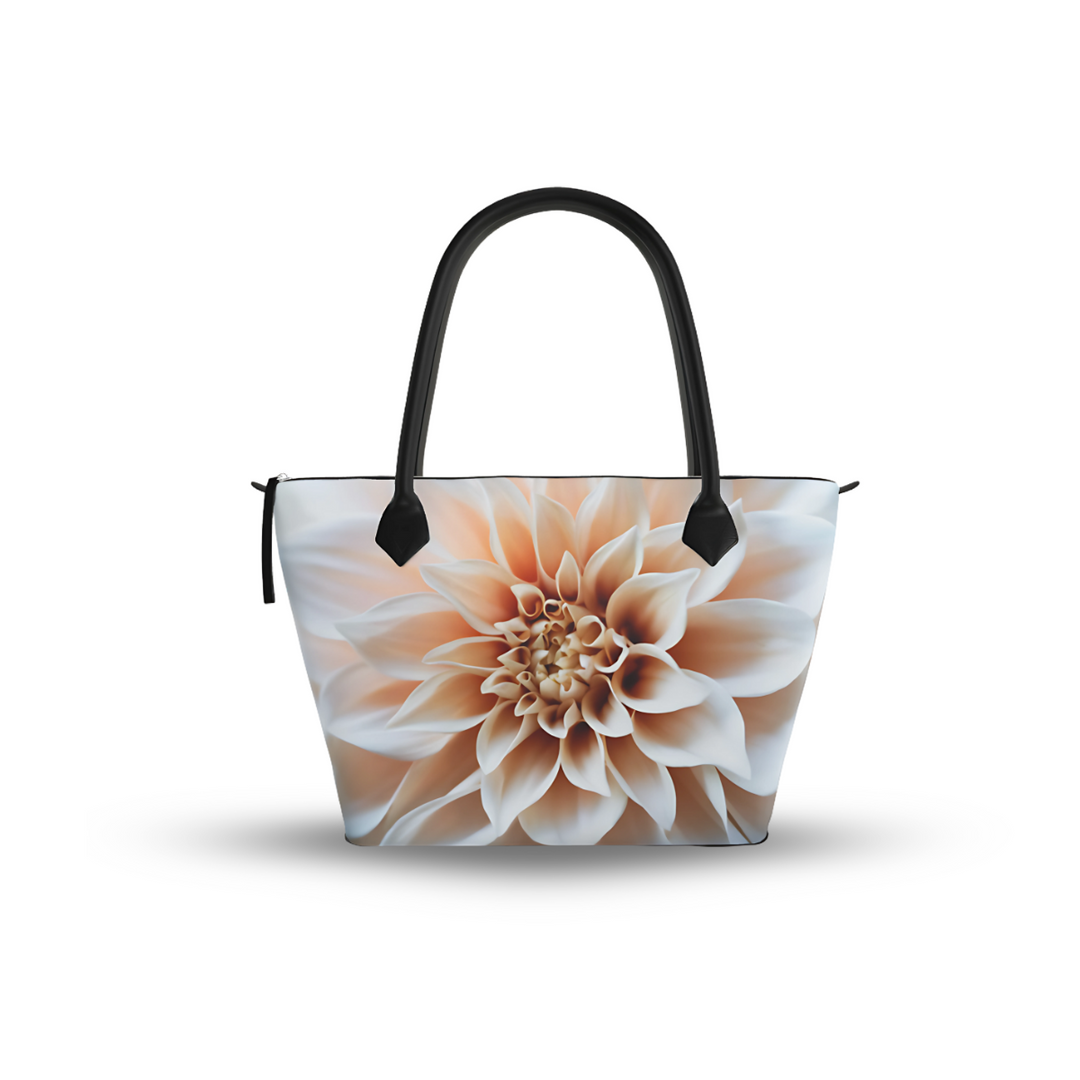 Structured zip top handbag featuring Cafe Au Lait botanical artwork, leather handles, interior pockets, and 17-inch laptop capacity. Featuring Smooth Nappa Leather