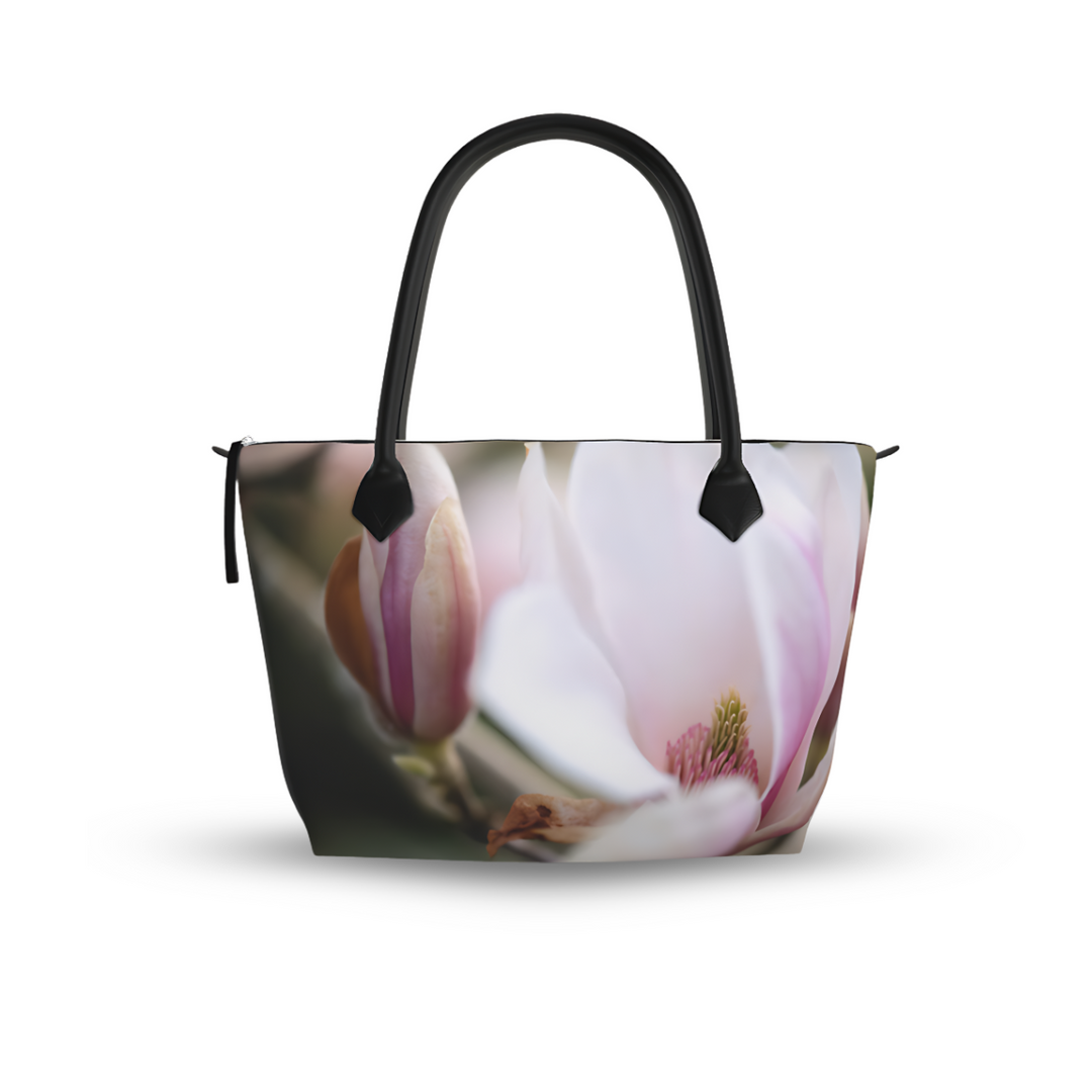 Stylish and functional, The Magnolia Zip Top Designer Tote Bag with Secure Zip Fastening and Internal Pockets is perfect for daily use.