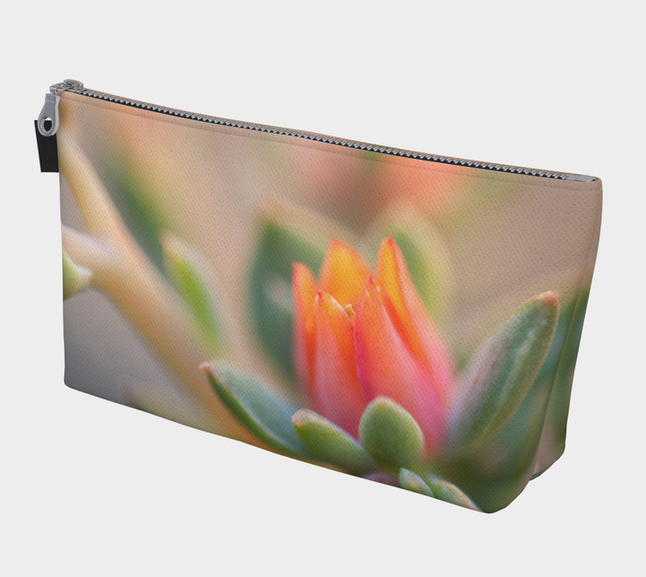 Stylish Echevervia Makeup Bag featuring a vibrant flower design and vegan leather pull, perfect for on-the-go essentials.