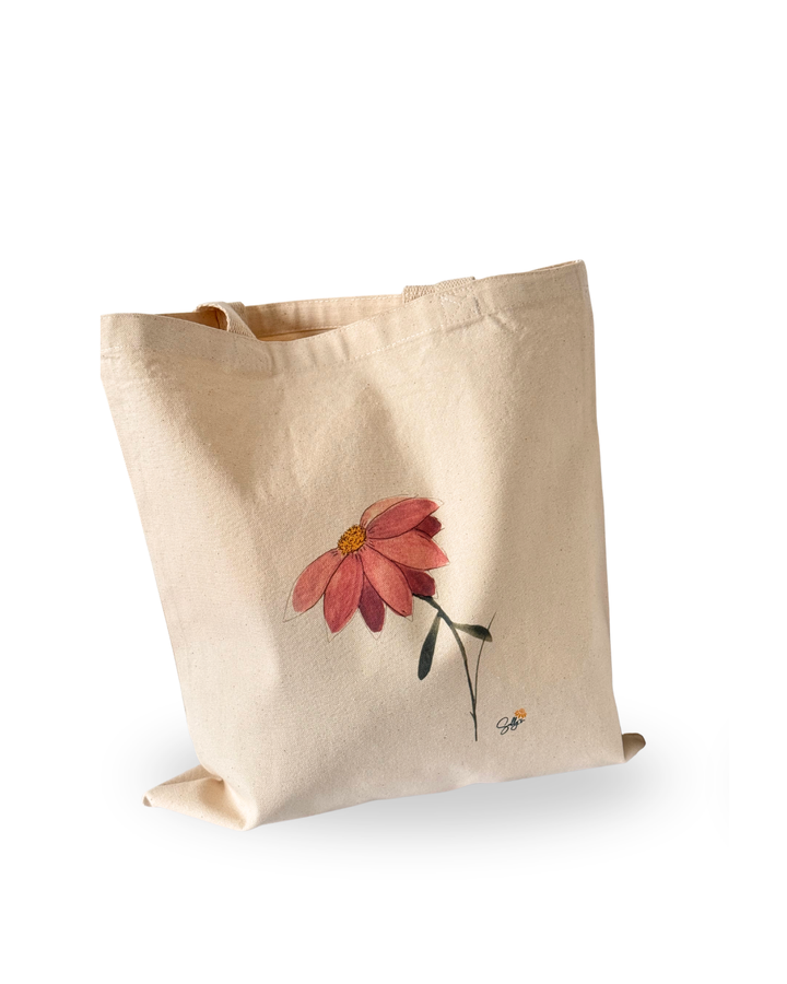 In Her Own Way watercolor floral canvas tote bag featuring an original pink and coral flower painting by botanical artist Sally Halvorsen.