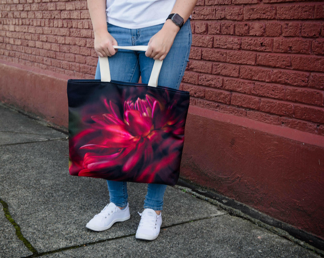 Red Velvet market tote hanging in front of model