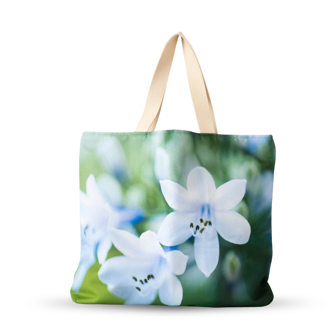Lily botanical market tote with fine art lily flower print on high-quality canvas and navy lined interior.
