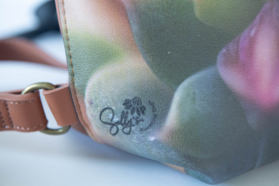 Echeveria Faux Leather Backpack showcases a stylish design and durable materials for everyday use.