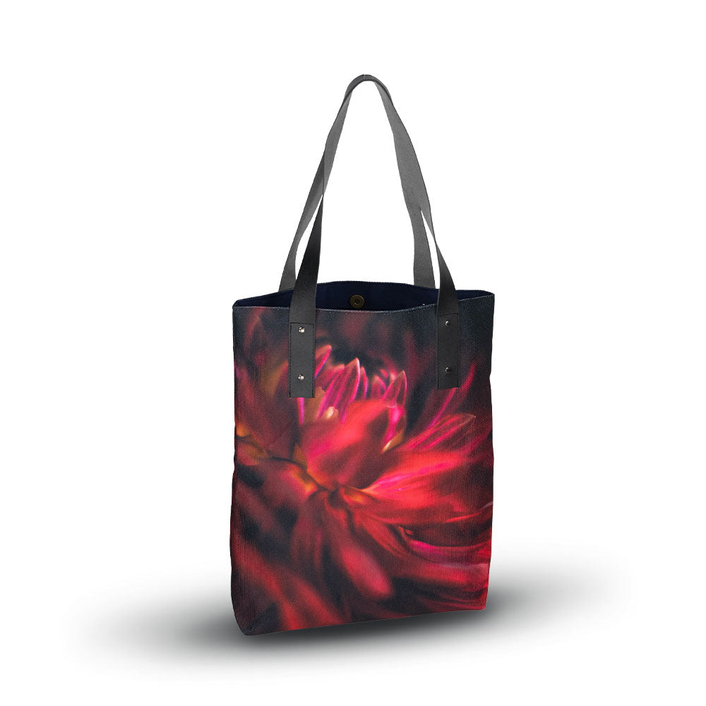 Closeup of Red Dahlia Canvas tote on white background.  