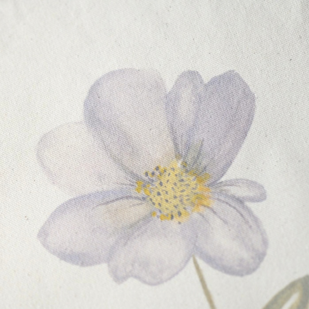Close-up of She Had Other Plans original watercolor flower by Sally Halvorsen, printed in soft lavender and yellow on natural canvas.