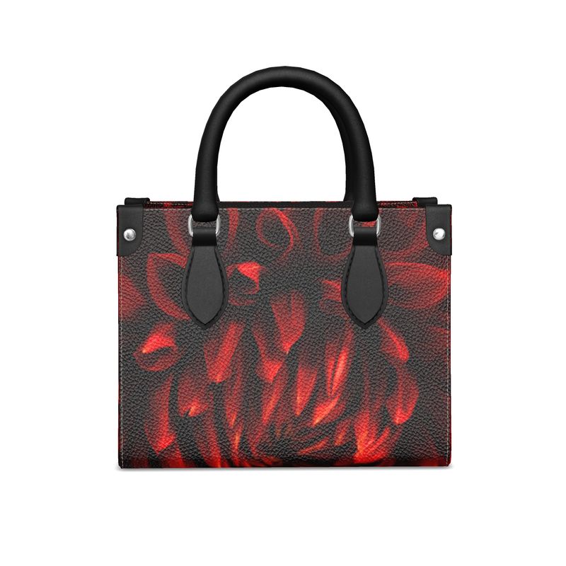 The Red Dahlia Mini Bonchurch Shopper Leather Bag features a vibrant floral design, blending elegance with artistry.