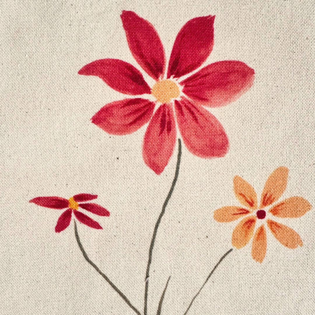 Close-up of the Better Together watercolor artwork printed on natural canvas, showing three colorful flowers and watercolor details.