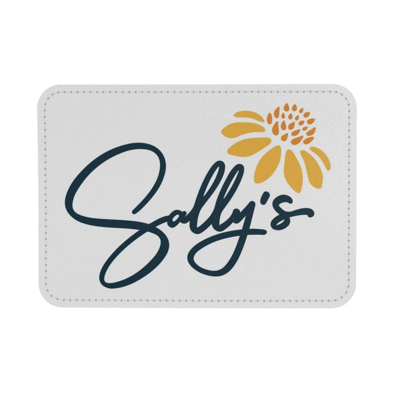 Sally's written in cursive in dark green with a artistically yellow and orange flower sitting above the name Sally's