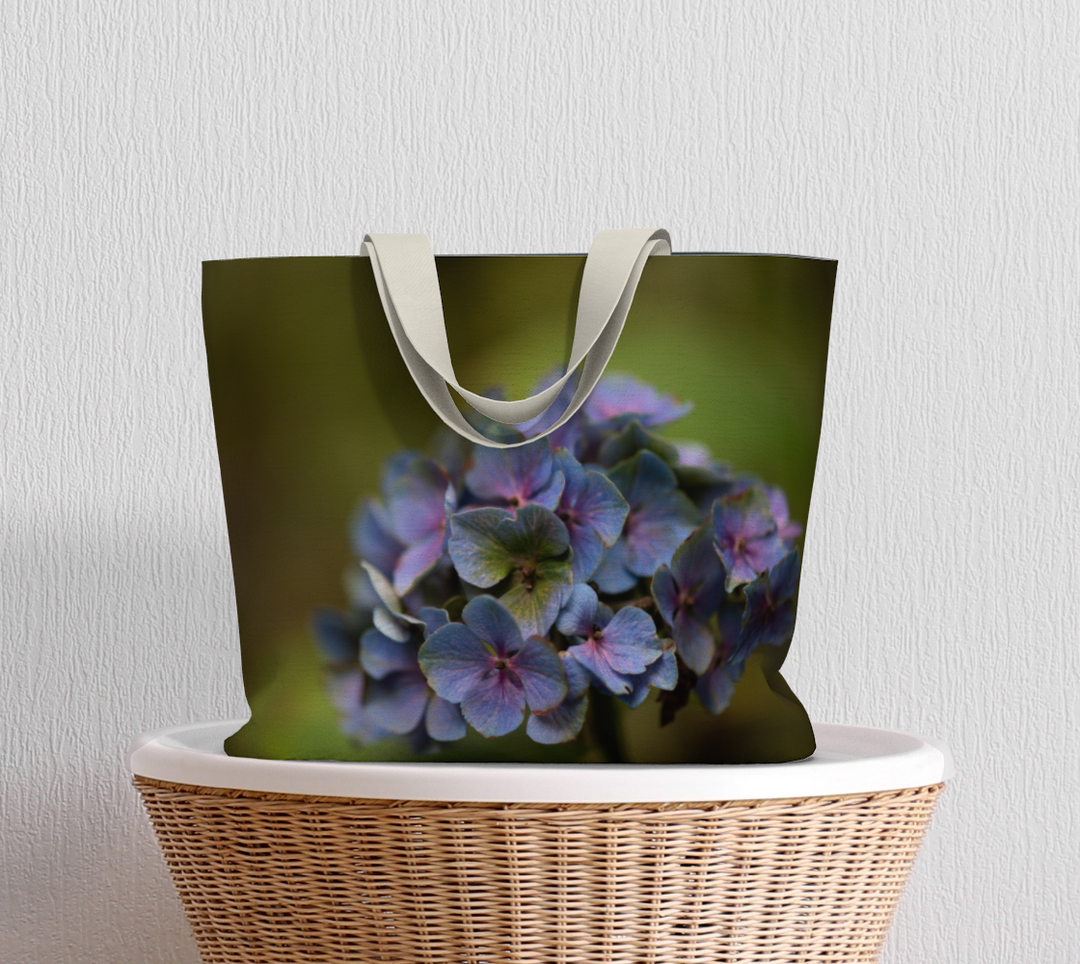 Tote bag of hydrangea flower sitting on basket