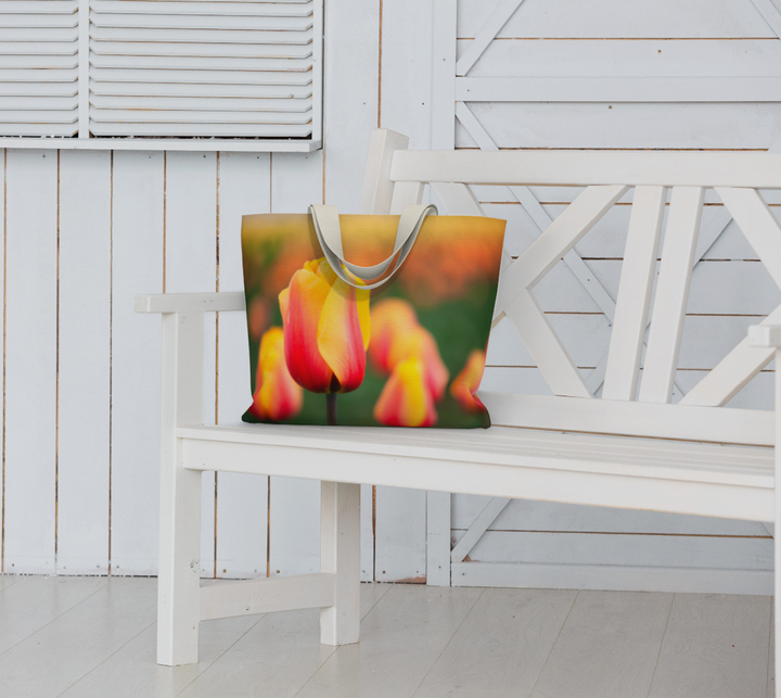 Tote bag of Tulips sitting on a bench
